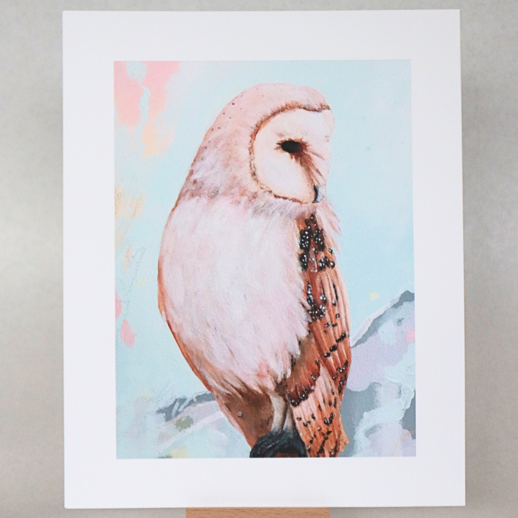 Unframed artwork of an owl on a stand against a gray background