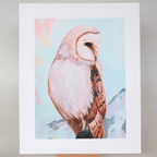 Unframed artwork of an owl on a stand against a gray background