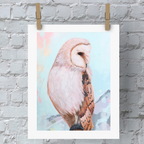 Poster of an owl on a white brick wall